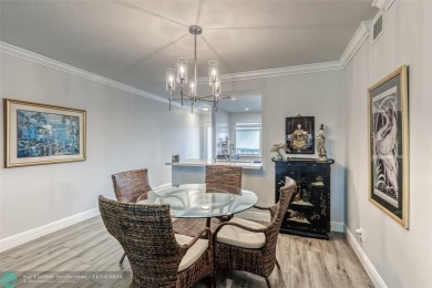 AN ABSOLUTE MUST SEE!! TOTALLY REMODELED PENTHOUSE UNIT. NEW CGI on Wynmoor Golf Course in Florida - for sale on GolfHomes.com, golf home, golf lot