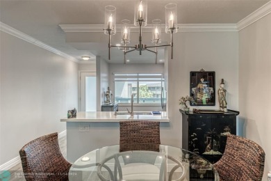 AN ABSOLUTE MUST SEE!! TOTALLY REMODELED PENTHOUSE UNIT. NEW CGI on Wynmoor Golf Course in Florida - for sale on GolfHomes.com, golf home, golf lot