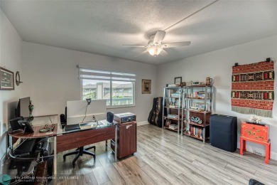 AN ABSOLUTE MUST SEE!! TOTALLY REMODELED PENTHOUSE UNIT. NEW CGI on Wynmoor Golf Course in Florida - for sale on GolfHomes.com, golf home, golf lot