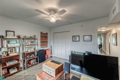 AN ABSOLUTE MUST SEE!! TOTALLY REMODELED PENTHOUSE UNIT. NEW CGI on Wynmoor Golf Course in Florida - for sale on GolfHomes.com, golf home, golf lot