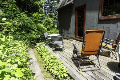 This beautifully reimagined Quechee Hollow end unit is turnkey! on Quechee Club in Vermont - for sale on GolfHomes.com, golf home, golf lot