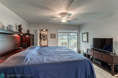 AN ABSOLUTE MUST SEE!! TOTALLY REMODELED PENTHOUSE UNIT. NEW CGI on Wynmoor Golf Course in Florida - for sale on GolfHomes.com, golf home, golf lot