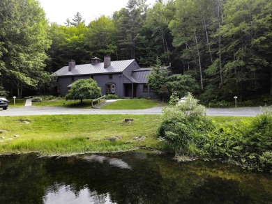 This beautifully reimagined Quechee Hollow end unit is turnkey! on Quechee Club in Vermont - for sale on GolfHomes.com, golf home, golf lot