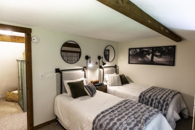 This beautifully reimagined Quechee Hollow end unit is turnkey! on Quechee Club in Vermont - for sale on GolfHomes.com, golf home, golf lot