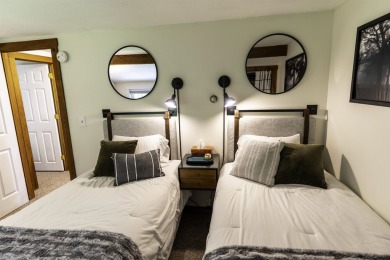 This beautifully reimagined Quechee Hollow end unit is turnkey! on Quechee Club in Vermont - for sale on GolfHomes.com, golf home, golf lot