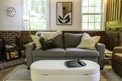 This beautifully reimagined Quechee Hollow end unit is turnkey! on Quechee Club in Vermont - for sale on GolfHomes.com, golf home, golf lot