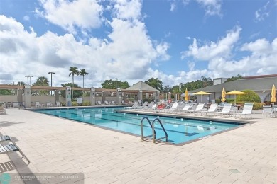 AN ABSOLUTE MUST SEE!! TOTALLY REMODELED PENTHOUSE UNIT. NEW CGI on Wynmoor Golf Course in Florida - for sale on GolfHomes.com, golf home, golf lot