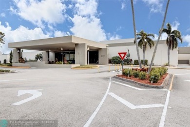 AN ABSOLUTE MUST SEE!! TOTALLY REMODELED PENTHOUSE UNIT. NEW CGI on Wynmoor Golf Course in Florida - for sale on GolfHomes.com, golf home, golf lot