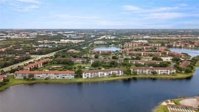 Beautifully renovated 2 bedroom, 2 bath residence overlooking on Flamingo Lakes Country Club in Florida - for sale on GolfHomes.com, golf home, golf lot