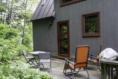 This beautifully reimagined Quechee Hollow end unit is turnkey! on Quechee Club in Vermont - for sale on GolfHomes.com, golf home, golf lot