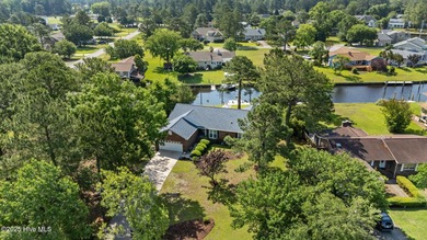 Waterfront Beauty in Fairfield Harbour with Marina Views! on Harbour Point Golf Club in North Carolina - for sale on GolfHomes.com, golf home, golf lot