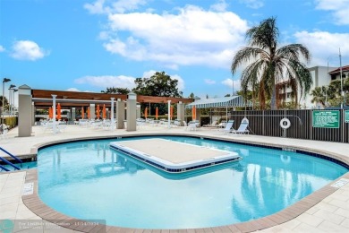 AN ABSOLUTE MUST SEE!! TOTALLY REMODELED PENTHOUSE UNIT. NEW CGI on Wynmoor Golf Course in Florida - for sale on GolfHomes.com, golf home, golf lot