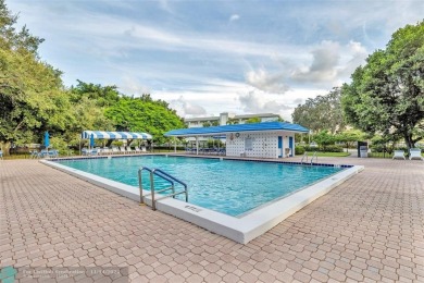 AN ABSOLUTE MUST SEE!! TOTALLY REMODELED PENTHOUSE UNIT. NEW CGI on Wynmoor Golf Course in Florida - for sale on GolfHomes.com, golf home, golf lot