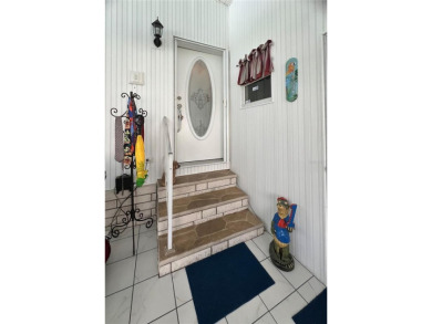 Exceptional Triple-Wide Home on Corner Lot in Pet-Friendly on Fairway Village Golf Course in Florida - for sale on GolfHomes.com, golf home, golf lot