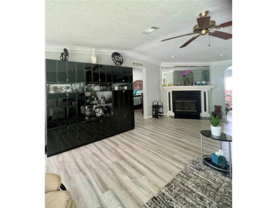 Exceptional Triple-Wide Home on Corner Lot in Pet-Friendly on Fairway Village Golf Course in Florida - for sale on GolfHomes.com, golf home, golf lot