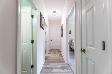 A beautiful brick, ranch, golf course home has many updates and on Santee-Cooper Country Club in South Carolina - for sale on GolfHomes.com, golf home, golf lot