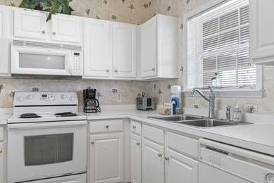 Rare Fairway-to-Waterway Views -- 3rd-Floor 2BR in Ironwood at on Arcadian Shores Golf Club in South Carolina - for sale on GolfHomes.com, golf home, golf lot