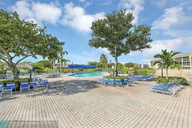 55+ COMMUNITY IN PHASE 3.  3rd FLOOR UNIT IN WELL KEPT BUILDING on Sunrise Lakes Phase III in Florida - for sale on GolfHomes.com, golf home, golf lot