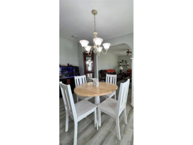 Exceptional Triple-Wide Home on Corner Lot in Pet-Friendly on Fairway Village Golf Course in Florida - for sale on GolfHomes.com, golf home, golf lot