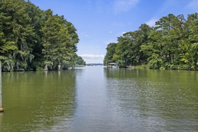 Experience serene lakefront living in this beautifully on Santee-Cooper Country Club in South Carolina - for sale on GolfHomes.com, golf home, golf lot