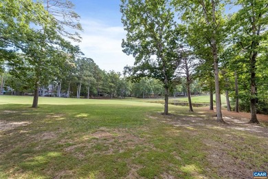 Enjoy the ease of one-level living in this inviting golf-front on Lake Monticello Golf Course in Virginia - for sale on GolfHomes.com, golf home, golf lot