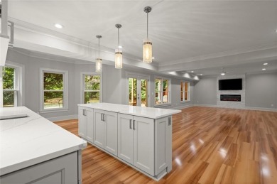 Welcome to an exquisite blend of luxury, elegance, and modern on The Golf Club of Georgia in Georgia - for sale on GolfHomes.com, golf home, golf lot