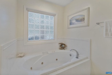 Enjoy the ease of one-level living in this inviting golf-front on Lake Monticello Golf Course in Virginia - for sale on GolfHomes.com, golf home, golf lot