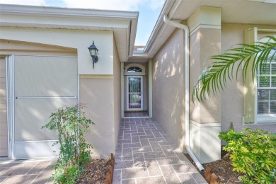 Care-free Florida living awaits in this impeccably maintained on Falcon Watch Golf Club in Florida - for sale on GolfHomes.com, golf home, golf lot