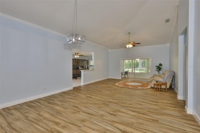 Care-free Florida living awaits in this impeccably maintained on Falcon Watch Golf Club in Florida - for sale on GolfHomes.com, golf home, golf lot