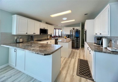 Exceptional Triple-Wide Home on Corner Lot in Pet-Friendly on Fairway Village Golf Course in Florida - for sale on GolfHomes.com, golf home, golf lot