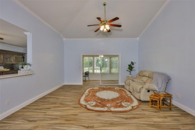 Care-free Florida living awaits in this impeccably maintained on Falcon Watch Golf Club in Florida - for sale on GolfHomes.com, golf home, golf lot