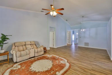 Care-free Florida living awaits in this impeccably maintained on Falcon Watch Golf Club in Florida - for sale on GolfHomes.com, golf home, golf lot