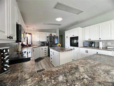 Exceptional Triple-Wide Home on Corner Lot in Pet-Friendly on Fairway Village Golf Course in Florida - for sale on GolfHomes.com, golf home, golf lot