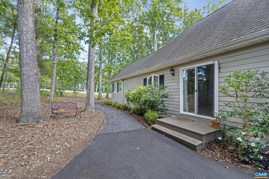 Enjoy the ease of one-level living in this inviting golf-front on Lake Monticello Golf Course in Virginia - for sale on GolfHomes.com, golf home, golf lot