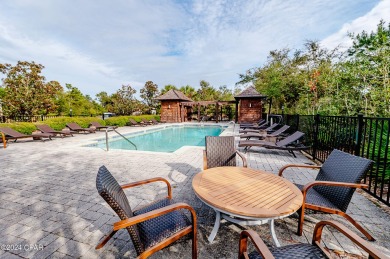 Discover luxury living in this exquisite 3-bedroom, 2.5-bathroom on Bay Point Resort Golf Club in Florida - for sale on GolfHomes.com, golf home, golf lot