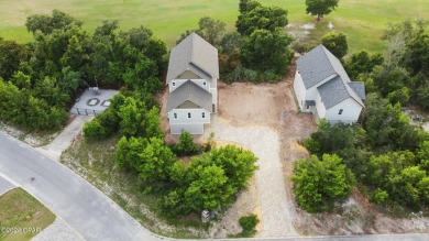 Discover luxury living in this exquisite 3-bedroom, 2.5-bathroom on Bay Point Resort Golf Club in Florida - for sale on GolfHomes.com, golf home, golf lot