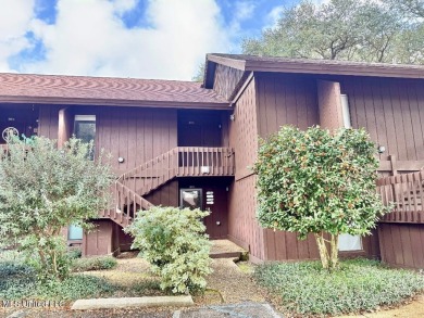 THIS UNFURNISHED 1 BEDROOM CONDO IS ON THE FIRST FLOOR AND on Diamondhead Country Club in Mississippi - for sale on GolfHomes.com, golf home, golf lot