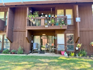 THIS UNFURNISHED 1 BEDROOM CONDO IS ON THE FIRST FLOOR AND on Diamondhead Country Club in Mississippi - for sale on GolfHomes.com, golf home, golf lot