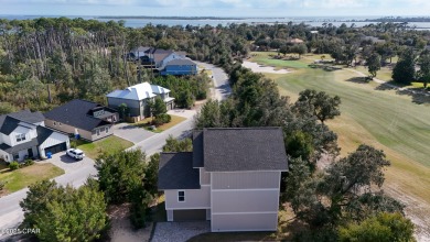 Discover luxury living in this exquisite 3-bedroom, 2.5-bathroom on Bay Point Resort Golf Club in Florida - for sale on GolfHomes.com, golf home, golf lot