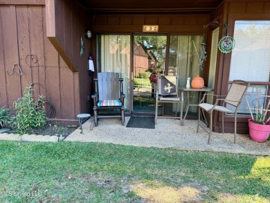 THIS UNFURNISHED 1 BEDROOM CONDO IS ON THE FIRST FLOOR AND on Diamondhead Country Club in Mississippi - for sale on GolfHomes.com, golf home, golf lot