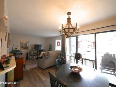 THIS UNFURNISHED 1 BEDROOM CONDO IS ON THE FIRST FLOOR AND on Diamondhead Country Club in Mississippi - for sale on GolfHomes.com, golf home, golf lot