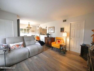 THIS UNFURNISHED 1 BEDROOM CONDO IS ON THE FIRST FLOOR AND on Diamondhead Country Club in Mississippi - for sale on GolfHomes.com, golf home, golf lot