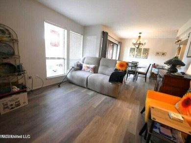 THIS UNFURNISHED 1 BEDROOM CONDO IS ON THE FIRST FLOOR AND on Diamondhead Country Club in Mississippi - for sale on GolfHomes.com, golf home, golf lot