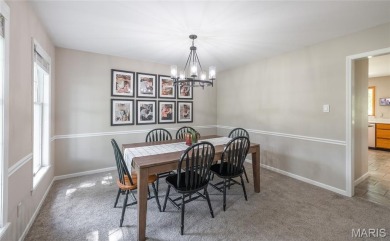 This stunning 2-story home offers 4 bedrooms, 2 full baths, and on Oak Meadow Country Club in Missouri - for sale on GolfHomes.com, golf home, golf lot