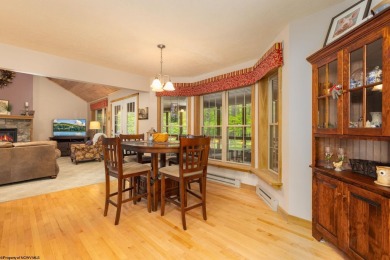 Welcome to Whispering Woods, a stunning ranch-style home nestled on Alpine Lake Resort in West Virginia - for sale on GolfHomes.com, golf home, golf lot