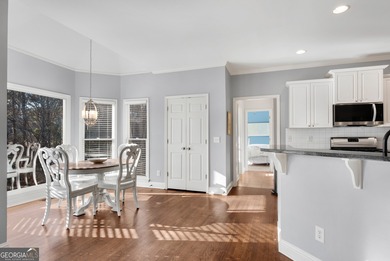 Nestled in the highly sought-after Brookstone Country Club on Brookstone Golf and Country Club in Georgia - for sale on GolfHomes.com, golf home, golf lot