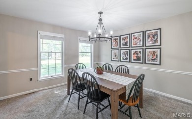 This stunning 2-story home offers 4 bedrooms, 2 full baths, and on Oak Meadow Country Club in Missouri - for sale on GolfHomes.com, golf home, golf lot