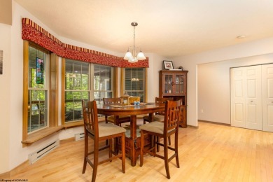 Welcome to Whispering Woods, a stunning ranch-style home nestled on Alpine Lake Resort in West Virginia - for sale on GolfHomes.com, golf home, golf lot