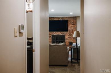 This stunning 2-story home offers 4 bedrooms, 2 full baths, and on Oak Meadow Country Club in Missouri - for sale on GolfHomes.com, golf home, golf lot