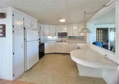 Welcome Home to Comfort, Community, and Connection. Tucked into on Fairway Village Golf Course in Florida - for sale on GolfHomes.com, golf home, golf lot